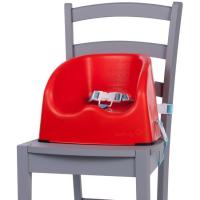 Trona elevadora color rojo. 2 correas de fijación para ajustarla a la mayoría de sillas y arnés de 3 puntos para sujetar al niño. Muy estable, con patas de goma en la base. Fácil de limpiar.Para niños que se mantengan solos hasta 15 kg SAFETY 1ST