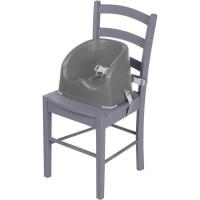 Trona elevadora color gris. 2 correas de fijación para ajustarla a la mayoría de sillas y arnés de 3 puntos para sujetar al niño. Muy estable, con patas de goma en la base. Fácil de limpiar.Para niños que se mantengan solos hasta 15 kg SAFETY 1ST