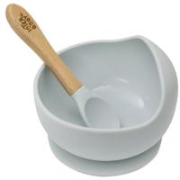 Cuenco de silicona azul con ventosa y cuchara con mango madera de haya INTERBABY
